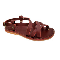 Duckfeet Bornholm sandal in Granate red leather, angled side view showing crossover straps and buckled ankle strap