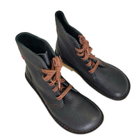 Pair of Duckfeet Sonderborg black leather boots viewed from above, laces tied