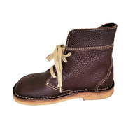 Side profile of the Duckfeet Sonderburg chocolate leather boot with contrast stitching and low natural sole