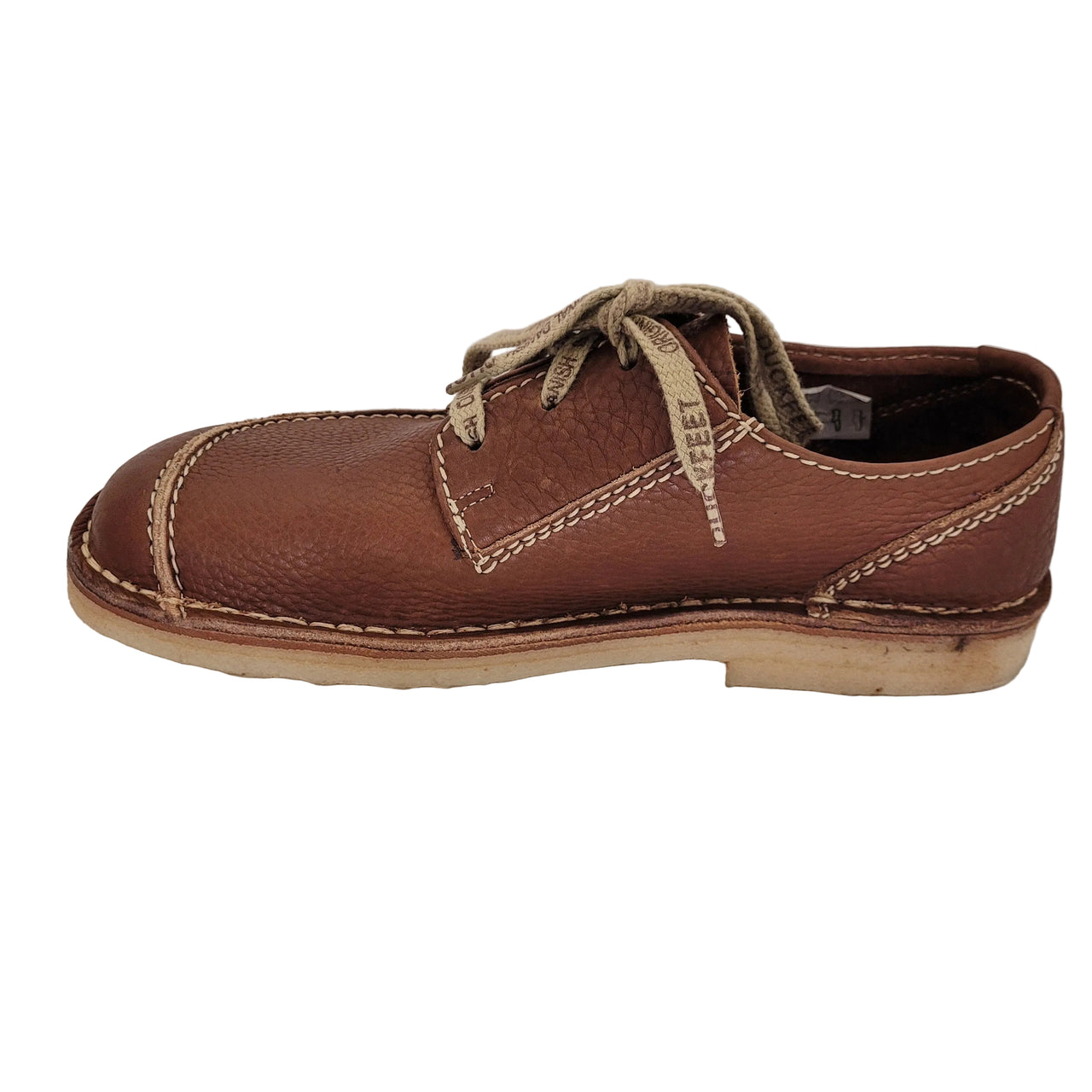 Side profile of the Duckfeet Svendborg leather shoe showing the low pale sole and stitched toe panel