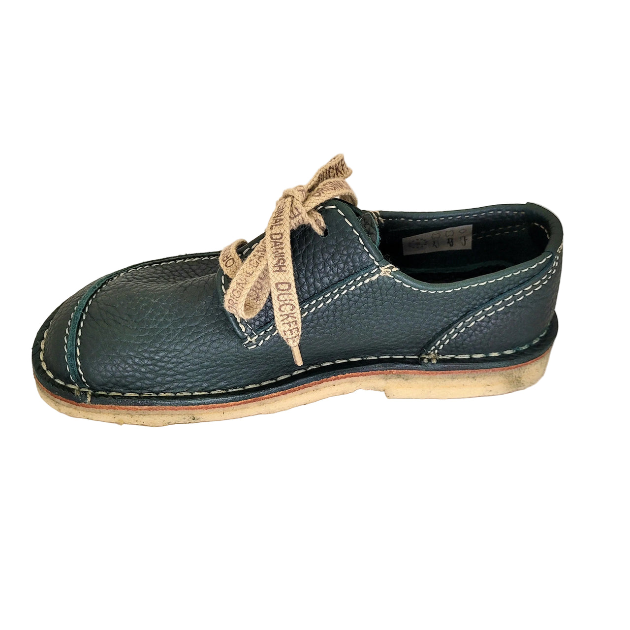 Side profile of the Duckfeet Svendborg green leather shoe with flat sole and tan woven laces