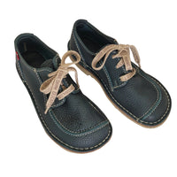 Pair of Duckfeet Svendborg green leather shoes viewed from above with printed woven laces tied