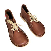 Pair of Duckfeet Helsingor nut leather boots viewed from above, showing laces and rounded toes
