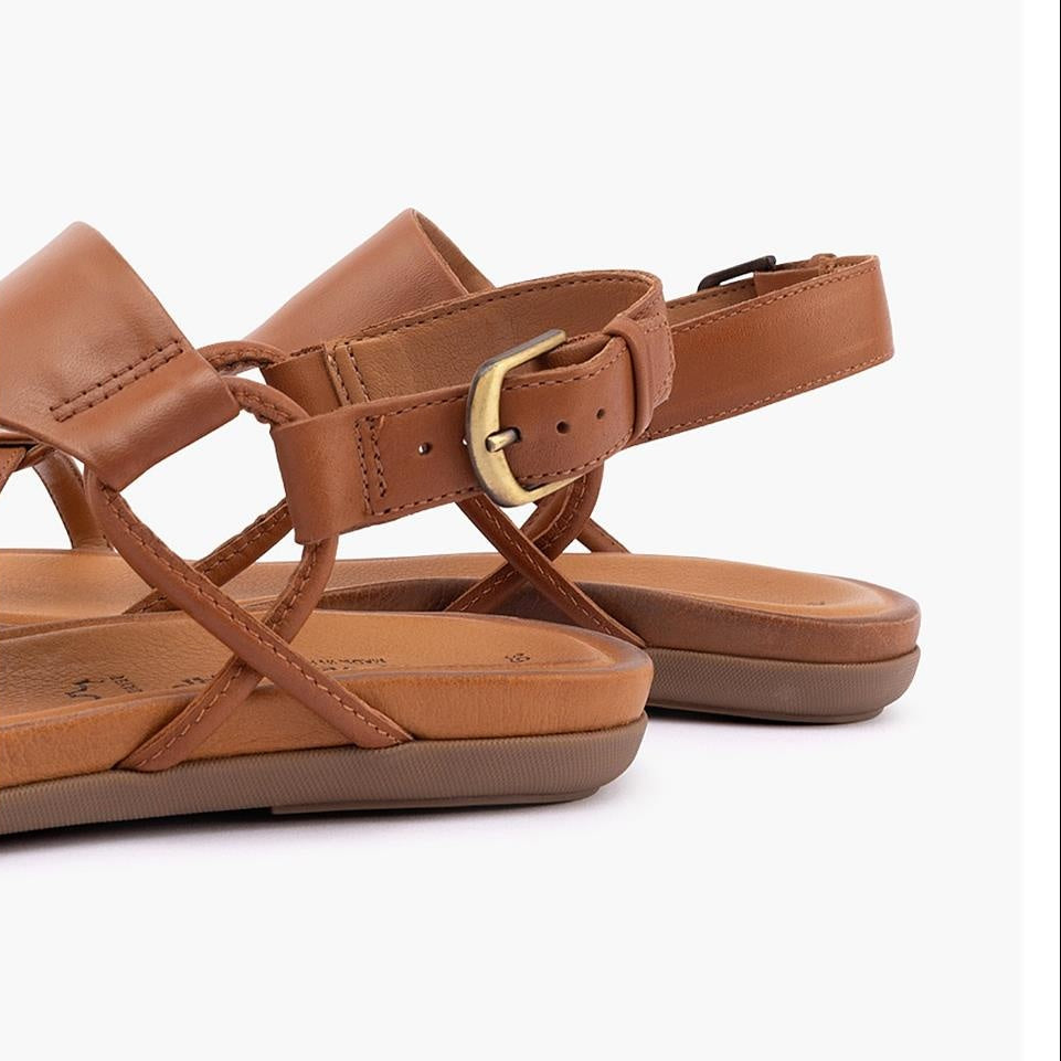 Brown sandals with a gold buckle