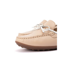 Beige loafers with white laces