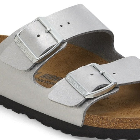 Close-up of the silver Arizona straps and Birkenstock-branded metal pin buckles
